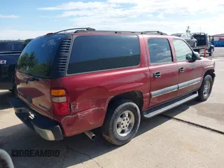 2003 Chevrolet Suburban LT with VIN 1GNEC16Z43J167217, listed as a IAAI auction lot 40772060 with 295,450 mi miles. Bid and sale history available at carsss.com. Image 4.
