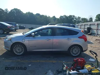 2014 Ford Focus Electric with VIN 1FADP3R43EL353378, listed as a IAAI auction lot 42555423 with 58,114 mi miles and . Bid and sale history available at DreamBid. Image 14.