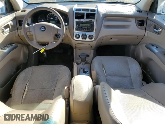 2005 Kia Sportage LX with VIN KNDJF723857134398, listed as a Copart auction lot 87893375 with 186,405 mi miles and Salvage Title. Bid and sale history available at carsss.com. Image 8.