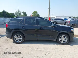 2019 GMC Terrain SLE z VIN 3GKALTEXXKL279826, wystawiony jako IAAI lot #42651208 z przebiegiem 131 740 mil mil oraz . Historia ofert i sprzedaży dostępna na DreamBid. Obrazek 13.