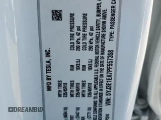 2023 Tesla Model 3 with VIN 5YJ3E1EA7PF557358, listed as a Copart auction lot 48891985 with 20,673 mi miles and Salvage title. Bid and sale history available at DreamBid. Image 15.