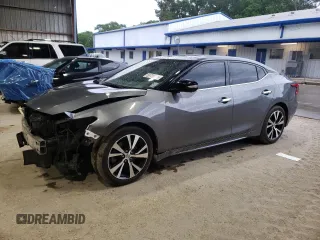 2016 Nissan Maxima Platinum with VIN 1N4AA6AP1GC427122, listed as a Copart auction lot 58720715 with 159,045 mi miles and Salvage title. Bid and sale history available at DreamBid. Image 1.