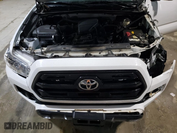 2017 Toyota Tacoma SR z VIN 5TFSX5EN4HX049906, wystawiony jako Copart lot #47266475 z przebiegiem 117 976 mil mil oraz Szkoda całkowita • Salvage title. Historia ofert i sprzedaży dostępna na DreamBid. Obrazek 11.