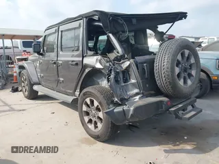 2018 Jeep Wrangler Unlimited Sahara z VIN 1C4HJXEG5JW194523, wystawiony jako IAAI lot #42056557 z przebiegiem 71 141 mil mil oraz . Historia ofert i sprzedaży dostępna na DreamBid. Obrazek 3.