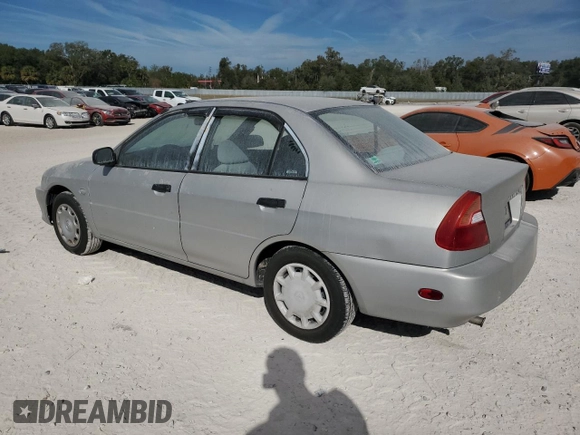 2001 Mitsubishi Mirage ES z VIN JA3AY26CX1U030593, wystawiony jako Copart lot #83749264 z przebiegiem 107 641 mil mil oraz Szkoda całkowita • Salvage title. Historia ofert i sprzedaży dostępna na DreamBid. Obrazek 2.