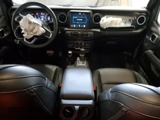 2023 Jeep Wrangler Sahara с VIN 1C4JJXP69PW698930, выставлен на аукционе Copart как лот 66679874 с пробегом 9 161 миль миль и Списание • Salvage title. История ставок и продаж доступна на DreamBid. Изображение 8.