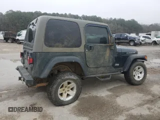 2005 Jeep Wrangler Rubicon with VIN 1J4FA69S95P377014, listed as a Copart auction lot 42676915 with 130,571 mi miles and Salvage Title. Bid and sale history available at carsss.com. Image 3.