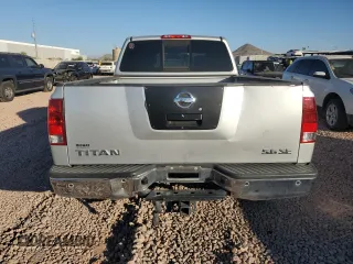 2010 Nissan Titan SE with VIN 1N6AA0CA5AN308613, listed as a Copart auction lot 82812894 with 98,887 mi miles and Salvage Title. Bid and sale history available at carsss.com. Image 6.