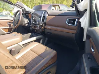 2021 Nissan Titan Pro-4X with VIN 1N6AA1ED4MN515673, listed as a IAAI auction lot 42028678 with 128,719 mi miles and . Bid and sale history available at DreamBid. Image 5.