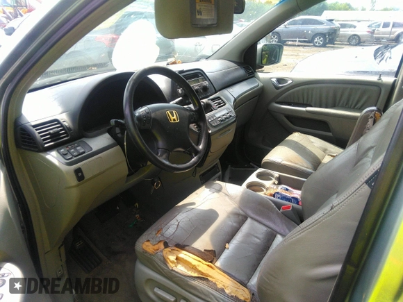 2006 Honda Odyssey EX-L with VIN 5FNRL38706B107724, listed as a IAAI auction lot 39245592 with 186,885 mi miles. Bid and sale history available at carsss.com. Image 5.