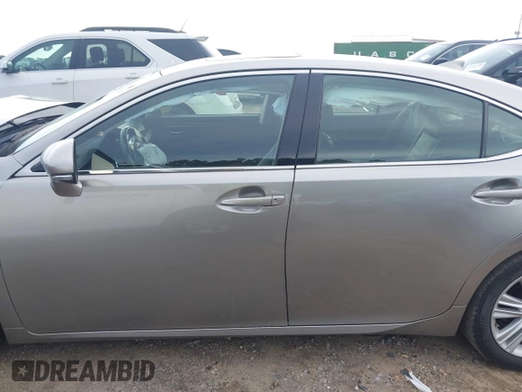 2015 Lexus ES 330 with VIN JTHBK1GG4F2207059, listed as a IAAI auction lot 42522324 with 146,506 mi miles and . Bid and sale history available at DreamBid. Image 14.