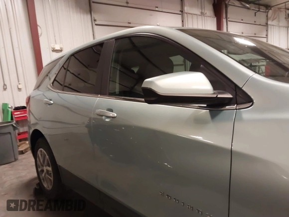 2022 Chevrolet Equinox LT with VIN 2GNAXKEV6N6112484, listed as a IAAI auction lot 41792583 with 104,910 mi miles and . Bid and sale history available at DreamBid. Image 14.