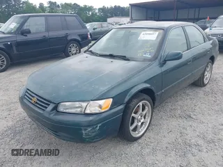 1997 Toyota Camry LE z VIN 4T1BG22K7VU005271, wystawiony jako IAAI lot #42098097 z przebiegiem Nie podano mil oraz . Historia ofert i sprzedaży dostępna na DreamBid. Obrazek 6.