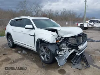2019 Volkswagen Atlas SEL R-Line z VIN 1V2RR2CA6KC594588, wystawiony jako IAAI lot #41686713 z przebiegiem 125 180 mil mil oraz . Historia ofert i sprzedaży dostępna na DreamBid. Obrazek 1.