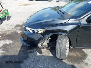 2023 Nissan Sentra S z VIN 3N1AB8BV7PY287992, wystawiony jako IAAI lot #42335056 z przebiegiem 14 482 mil mil oraz . Historia ofert i sprzedaży dostępna na DreamBid. Obrazek 6.