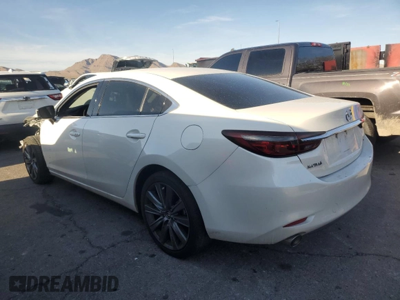 2021 Mazda 6 Touring with VIN JM1GL1VM6M1612064, listed as a Copart auction lot 50189355 with 69,319 mi miles and Salvage Title. Bid and sale history available at DreamBid. Image 2.