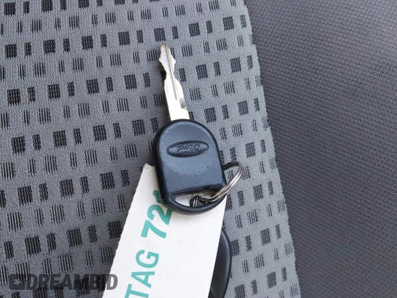 2007 Ford Focus S z VIN 1FAHP34N07W360761, wystawiony jako IAAI lot #40754946 z przebiegiem 121 371 mil mil oraz . Historia ofert i sprzedaży dostępna na DreamBid. Obrazek 11.