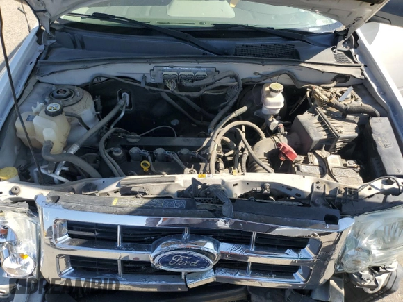 2012 Ford Escape XLS z VIN 1FMCU0C76CKB12316, wystawiony jako Copart lot #65011265 z przebiegiem 139 992 mil mil oraz Szkoda całkowita • Salvage title. Historia ofert i sprzedaży dostępna na DreamBid. Obrazek 12.