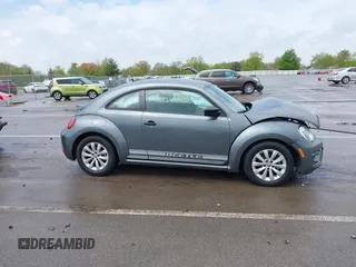 2018 Volkswagen Beetle S z VIN 3VWFD7AT1JM726428, wystawiony jako IAAI lot #42154938 z przebiegiem 41 279 mil mil oraz . Historia ofert i sprzedaży dostępna na DreamBid. Obrazek 13.
