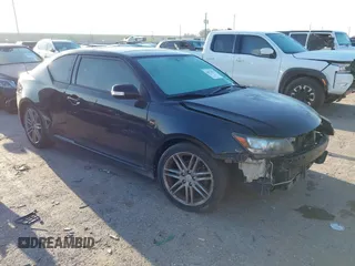 2013 Scion tC with VIN JTKJF5C77D3050609, listed as a IAAI auction lot 41872911 with 197,531 mi miles. Bid and sale history available at carsss.com. Image 1.