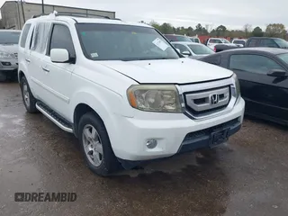 2011 Honda Pilot EX-L with VIN 5FNYF3H67BB014641, listed as a IAAI auction lot 41276698 with 193,656 mi miles and . Bid and sale history available at DreamBid. Image 1.