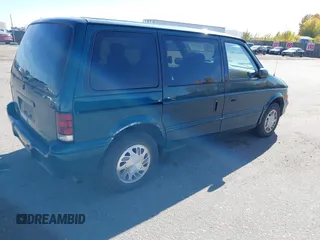 1995 Dodge Caravan z VIN 2B4GH55R6SR126834, wystawiony jako IAAI lot #40688913 z przebiegiem 39 192 mil mil oraz . Historia ofert i sprzedaży dostępna na DreamBid. Obrazek 4.
