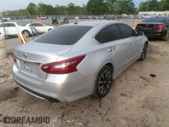 2018 Nissan Altima SR with VIN 1N4AL3AP8JC245501, listed as a IAAI auction lot 42026160 with 114,022 mi miles and . Bid and sale history available at carsss.com. Image 4.