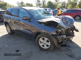 2017 Jeep Grand Cherokee Laredo with VIN 1C4RJEAG8HC944037, listed as a IAAI auction lot 41299619 with 140,405 mi miles. Bid and sale history available at carsss.com. Image 1.