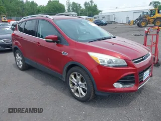 2016 Ford Escape Titanium with VIN 1FMCU9JX8GUB11069, listed as a IAAI auction lot 42704693 with 133,585 mi miles and . Bid and sale history available at DreamBid. Image 1.