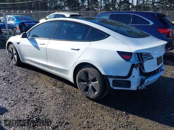 2023 Tesla Model 3 z VIN 5YJ3E1EA0PF611244, wystawiony jako IAAI lot #41455102 z przebiegiem 21 867 mil mil oraz . Historia ofert i sprzedaży dostępna na DreamBid. Obrazek 3.