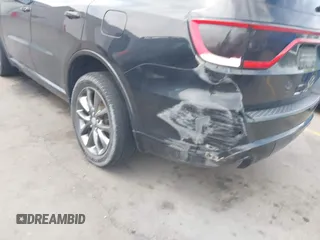 2015 Dodge Durango SXT with VIN 1C4RDJAGXFC796034, listed as a IAAI auction lot 42057983 with 159,108 mi miles and . Bid and sale history available at DreamBid. Image 6.