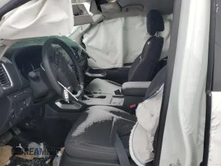 2024 Nissan Frontier SV z VIN 1N6ED1FK3RN618063, wystawiony jako Copart lot #45242025 z przebiegiem 24 979 mil mil oraz Szkoda całkowita • Salvage title. Historia ofert i sprzedaży dostępna na DreamBid. Obrazek 7.
