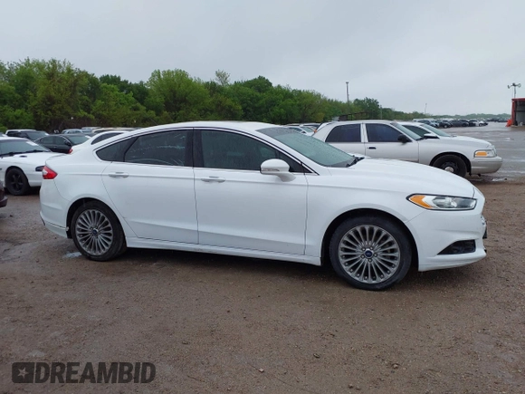 2016 Ford Fusion Titanium with VIN 3FA6P0K92GR400269, listed as a IAAI auction lot 41961043 with 191,638 mi miles and . Bid and sale history available at DreamBid. Image 13.