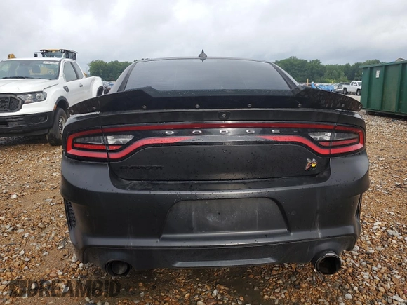 2019 Dodge Charger Scat Pack z VIN 2C3CDXGJ1KH604359, wystawiony jako Copart lot #60796535 z przebiegiem 65 418 mil mil oraz Szkoda całkowita • Salvage title. Historia ofert i sprzedaży dostępna na DreamBid. Obrazek 6.