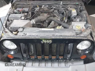 2009 Jeep Wrangler Unlimited Rubicon z VIN 1J8GA69109L738914, wystawiony jako IAAI lot #40379001 z przebiegiem 120 153 mil mil oraz . Historia ofert i sprzedaży dostępna na DreamBid. Obrazek 10.