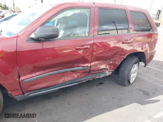 2008 Jeep Grand Cherokee Laredo with VIN 1J8GS48K98C226482, listed as a IAAI auction lot 41850279 with 154,392 mi miles. Bid and sale history available at carsss.com. Image 12.