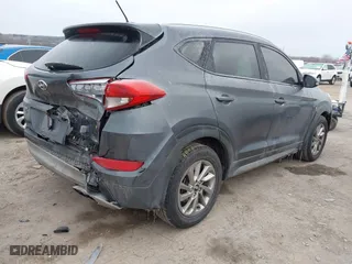 2017 Hyundai Tucson Value with VIN KM8J33A22HU358357, listed as a IAAI auction lot 41583774 with 139,338 mi miles. Bid and sale history available at carsss.com. Image 4.