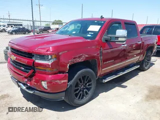 2017 Chevrolet Silverado 1500 LT with VIN 3GCUKREC4HG164281, listed as a IAAI auction lot 42037712 with 133,935 mi miles and . Bid and sale history available at DreamBid. Image 2.
