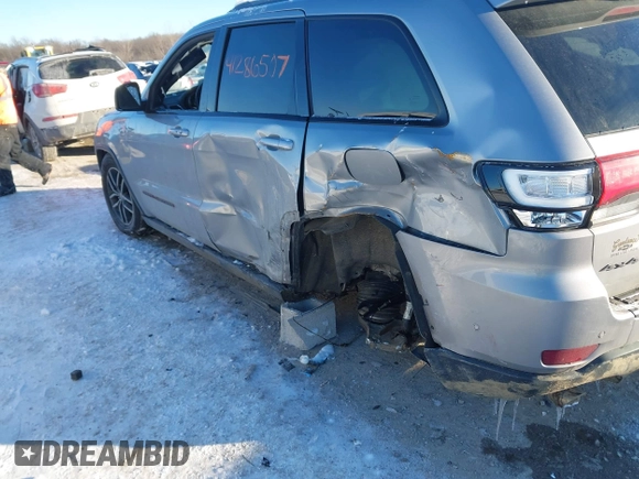 2017 Jeep Grand Cherokee Trailhawk with VIN 1C4RJFLT4HC657682, listed as a IAAI auction lot 41286507 with 123,646 mi miles and . Bid and sale history available at DreamBid. Image 6.