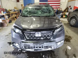 2021 Honda Passport Elite z VIN 5FNYF8H05MB021597, wystawiony jako Copart lot #44463515 z przebiegiem Nie podano mil oraz Szkoda całkowita • Salvage title. Historia ofert i sprzedaży dostępna na DreamBid. Obrazek 5.