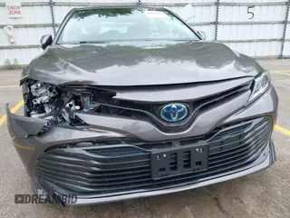 2019 Toyota Camry Hybrid LE z VIN 4T1B31HK4KU511360, wystawiony jako IAAI lot #42298260 z przebiegiem 133 019 mil mil oraz . Historia ofert i sprzedaży dostępna na DreamBid. Obrazek 17.
