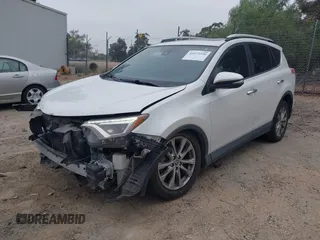 2016 Toyota RAV4 Limited with VIN JTMYFREV2GJ065656, listed as a IAAI auction lot 42575320 with 124,648 mi miles and . Bid and sale history available at DreamBid. Image 2.
