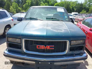 1996 GMC Sierra 1500 z VIN 1GTEK19R6TE514322, wystawiony jako IAAI lot #42253821 z przebiegiem 190 491 mil mil oraz . Historia ofert i sprzedaży dostępna na DreamBid. Obrazek 12.