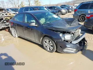 2015 Chevrolet Cruze LS z VIN 1G1PA5SH3F7244164, wystawiony jako IAAI lot #41491374 z przebiegiem 100 592 mil mil oraz . Historia ofert i sprzedaży dostępna na DreamBid. Obrazek 1.