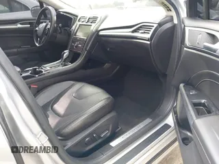 2016 Ford Fusion Titanium z VIN 3FA6P0K92GR135076, wystawiony jako IAAI lot #42604875 z przebiegiem 192 785 mil mil oraz . Historia ofert i sprzedaży dostępna na DreamBid. Obrazek 5.