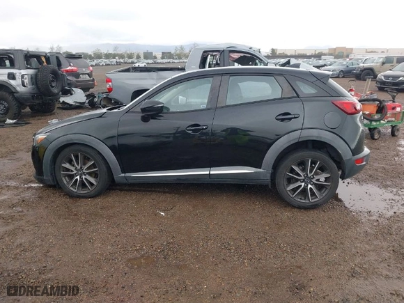 2016 Mazda CX-3 Grand Touring with VIN JM1DKBD7XG0125001, listed as a IAAI auction lot 41777712 with NaN miles. Bid and sale history available at carsss.com. Image 15.