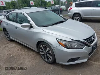 2017 Nissan Altima SV with VIN 1N4AL3AP3HC151424, listed as a IAAI auction lot 42697536 with 157,066 mi miles and . Bid and sale history available at DreamBid. Image 1.