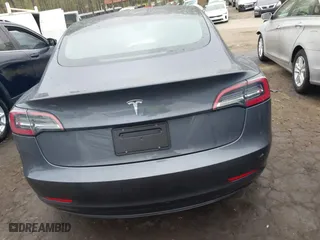 2023 Tesla Model 3 with VIN 5YJ3E1EA7PF642913, listed as a IAAI auction lot 41898249 with 26,394 mi miles. Bid and sale history available at carsss.com. Image 17.