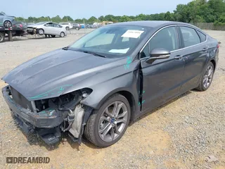 2020 Ford Fusion Hybrid Titanium with VIN 3FA6P0RU0LR141494, listed as a IAAI auction lot 39967898 with 88,152 mi miles. Bid and sale history available at carsss.com. Image 18.