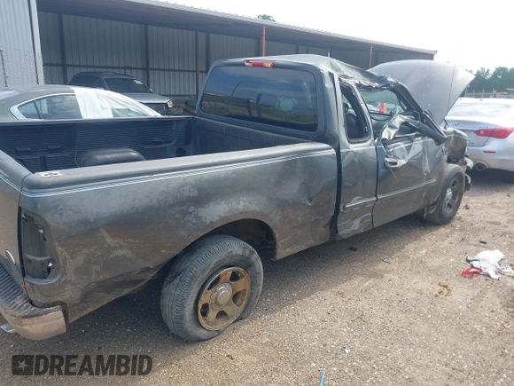 2002 Ford F-150 XL with VIN 1FTRX17W72NA87338, listed as a IAAI auction lot 42583398 with Not provided miles and . Bid and sale history available at DreamBid. Image 6.